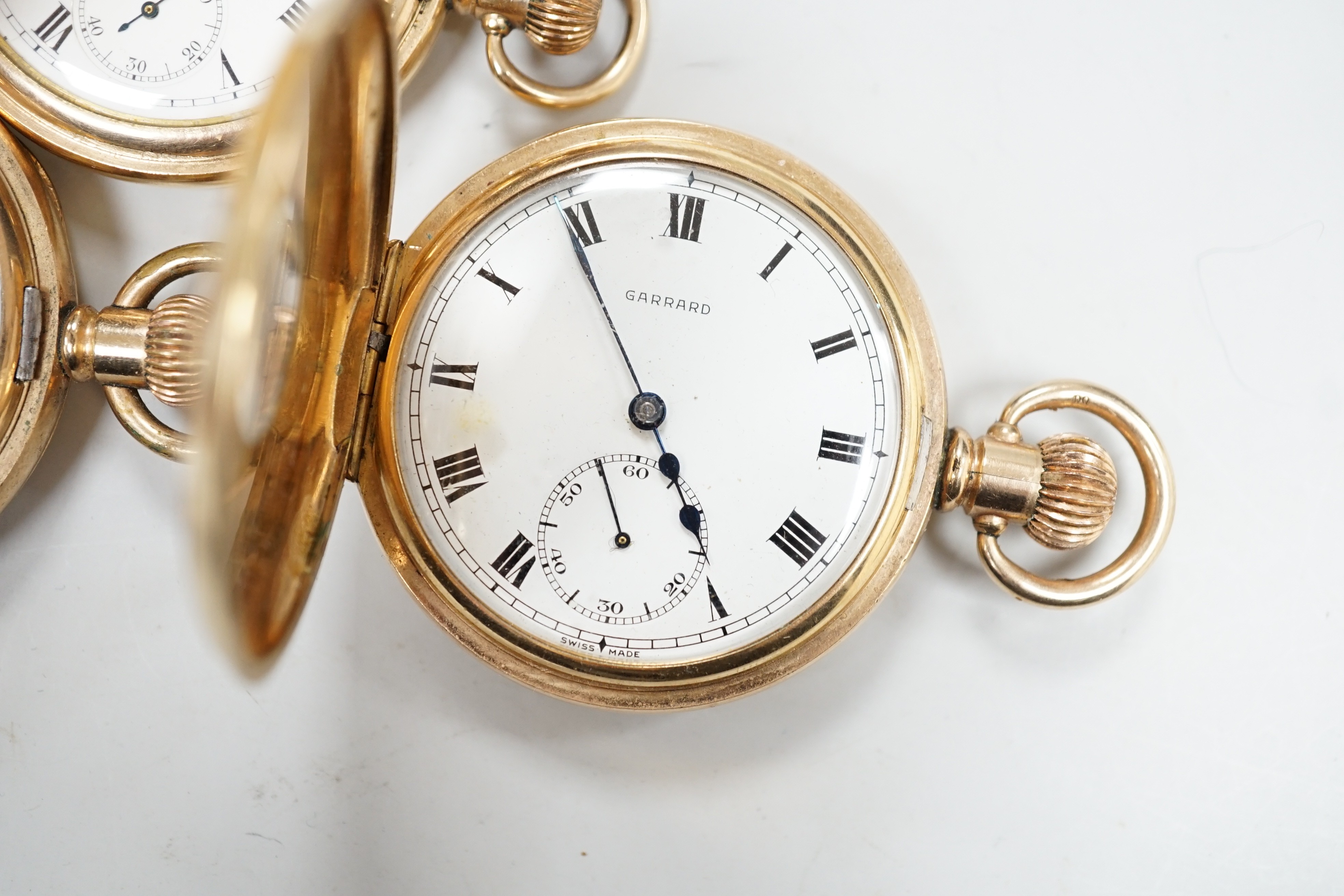 A gold plated Waltham hunter keyless pocket watch and two gold plated half hunter pocket watches, John Elkin and Garrard.